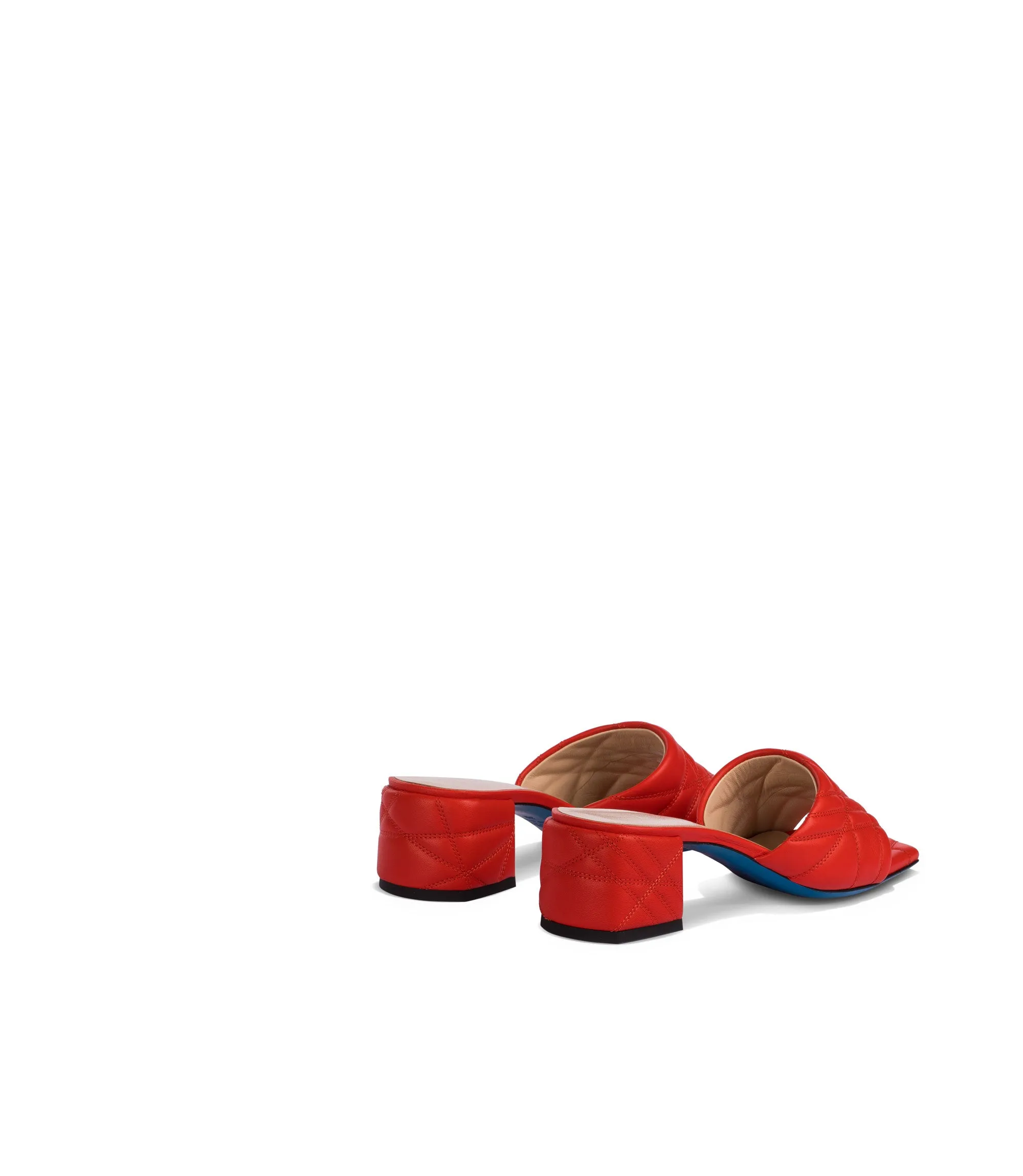 Coral red quilted nappa leather mules