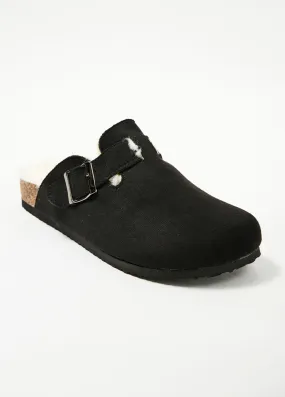 Mules tendance fourrées avec boucle
